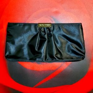 Mario Tricoci Clutch